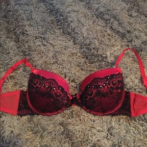 Red and black lace bra